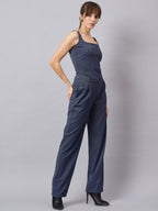 Blue corset top with flared jeans